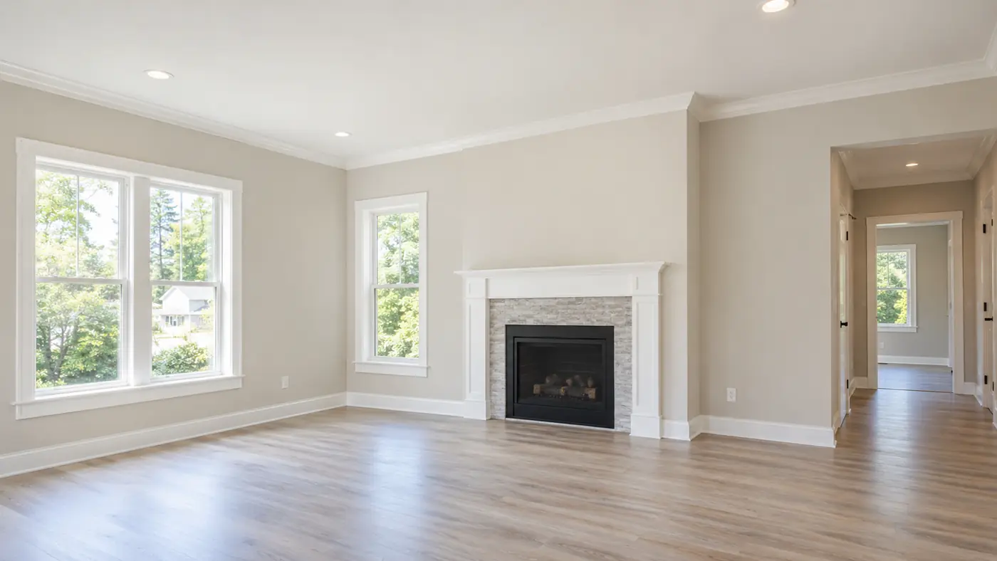 Finished living room drywall with crown molding and stone fireplace in Mason, OH