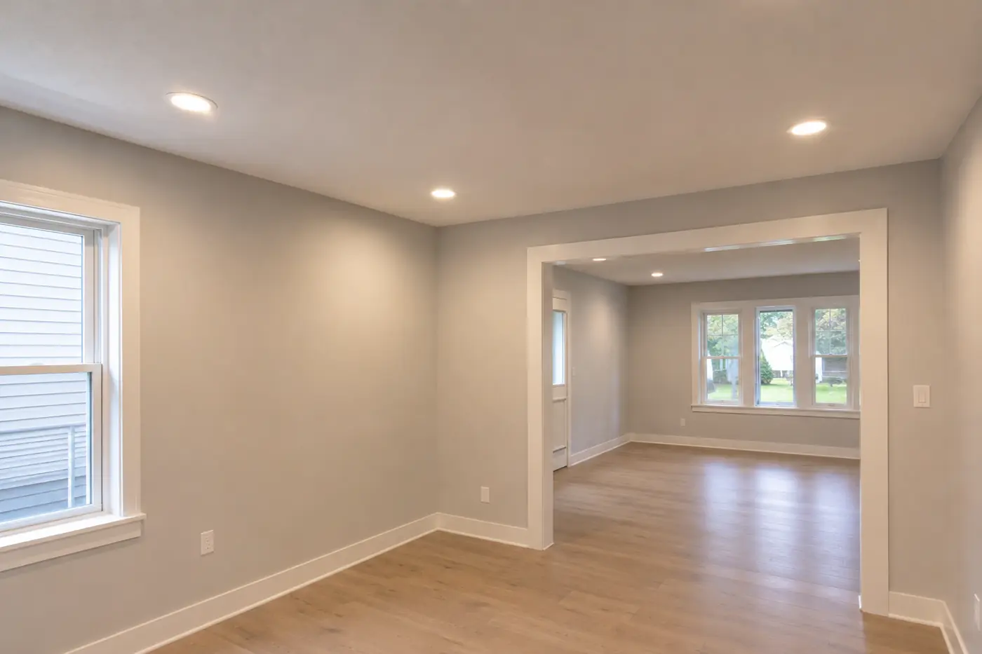 Recessed LED lighting installed in an empty room with hardwood floors in Mason, OH